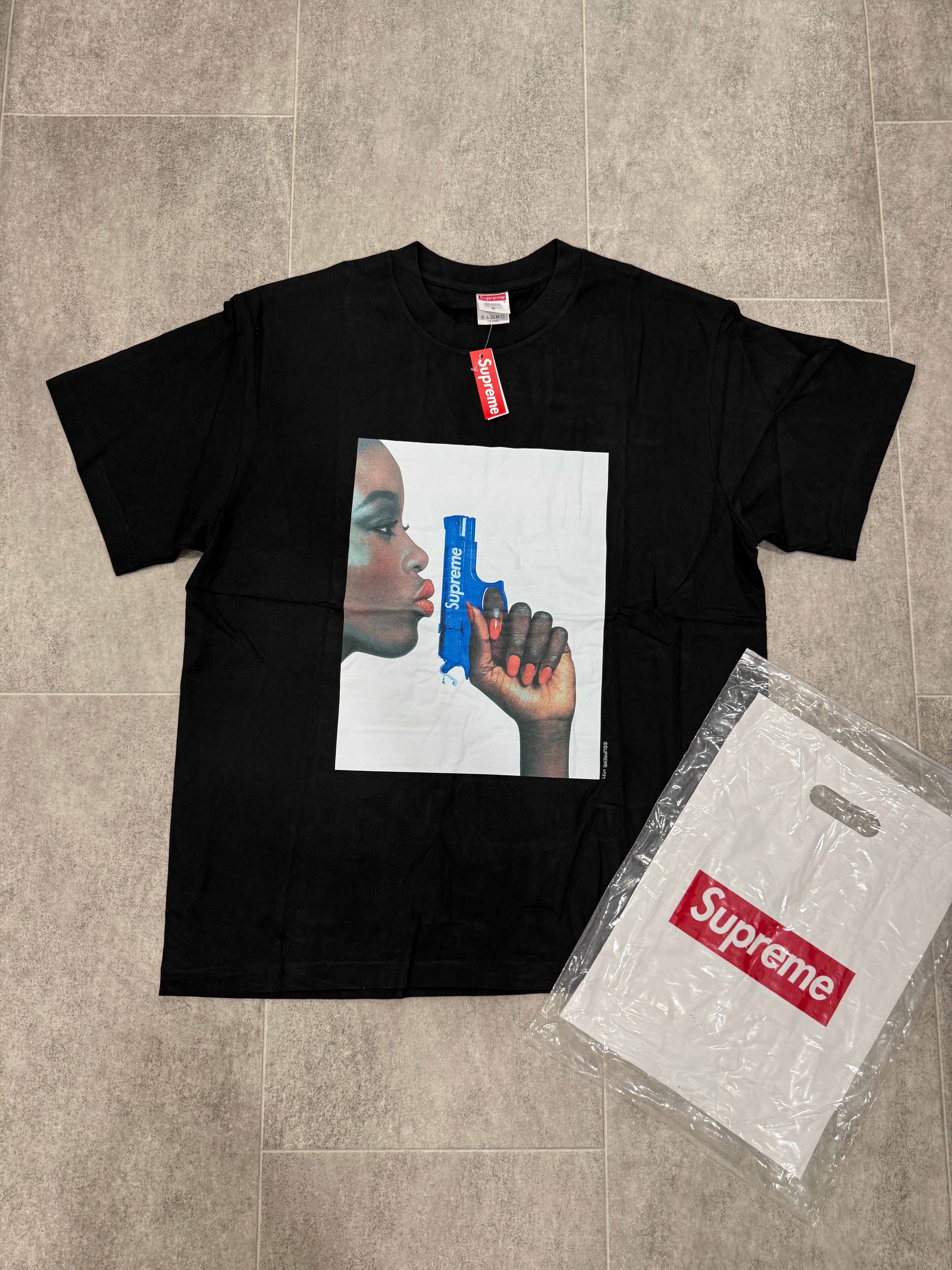 Black Shirt blue Gun